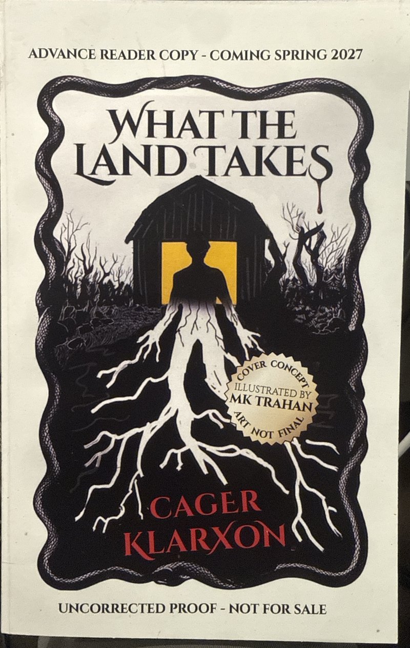 What the Land Takes advance reader copy: a figure in a lit barn doorway, roots spreading into black earth, framed by a serpent